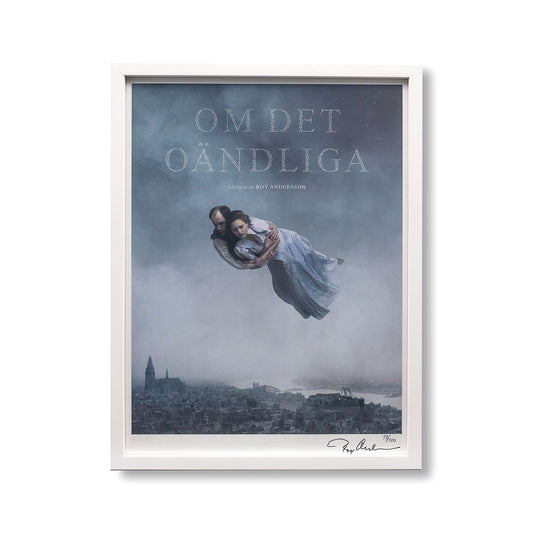 Roy Andersson: Limited Edition Print, featuring photograph of man floating above a city holding a woman.