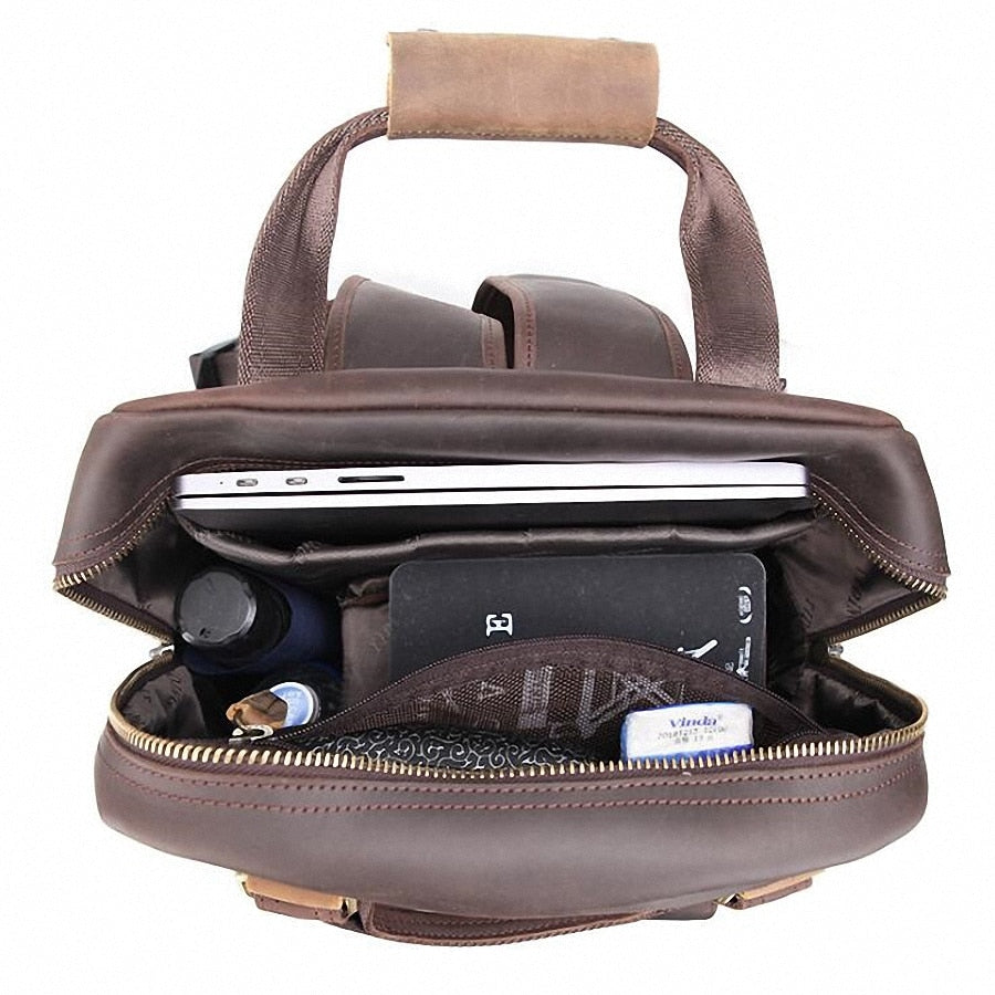 Gaetano Leather Camera Bag with Tripod Holder, open and showing storage