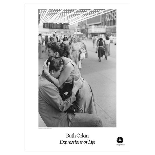 Black & white image of couple embracing on the street as people pass by. Exhibition title below: Ruth Orkin | Expressions of Life