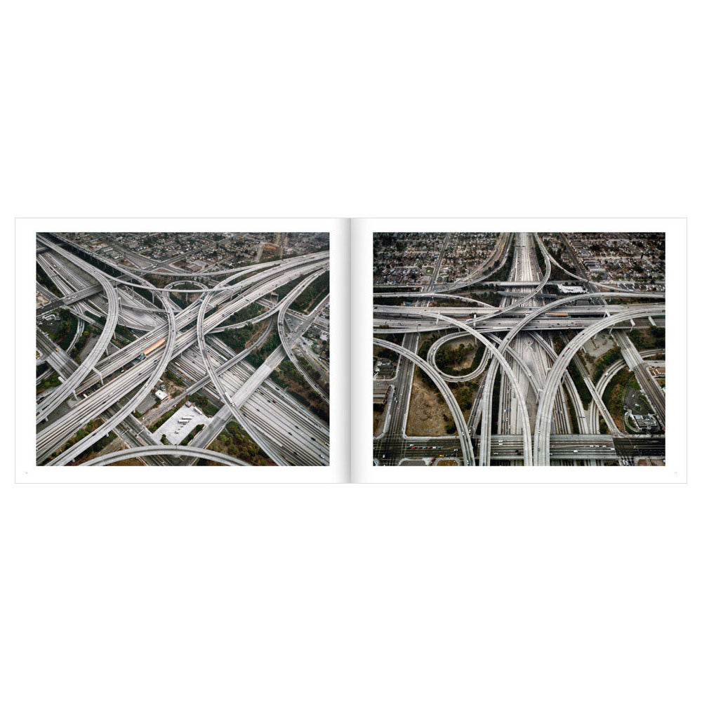 Open spread of Edward Burtynsky: Oil, showing color photos of intertwining roads and overpasses.