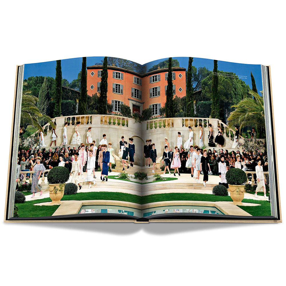 Spread of Chanel: The Impossible Collection, showing a full-width color photo of an elegant outdoor garden setting