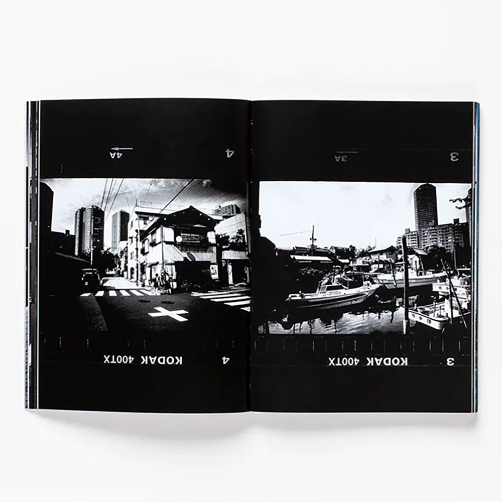 Spread of Daido Moriyama: How I Take Photographs, showing two black and white photos side by side