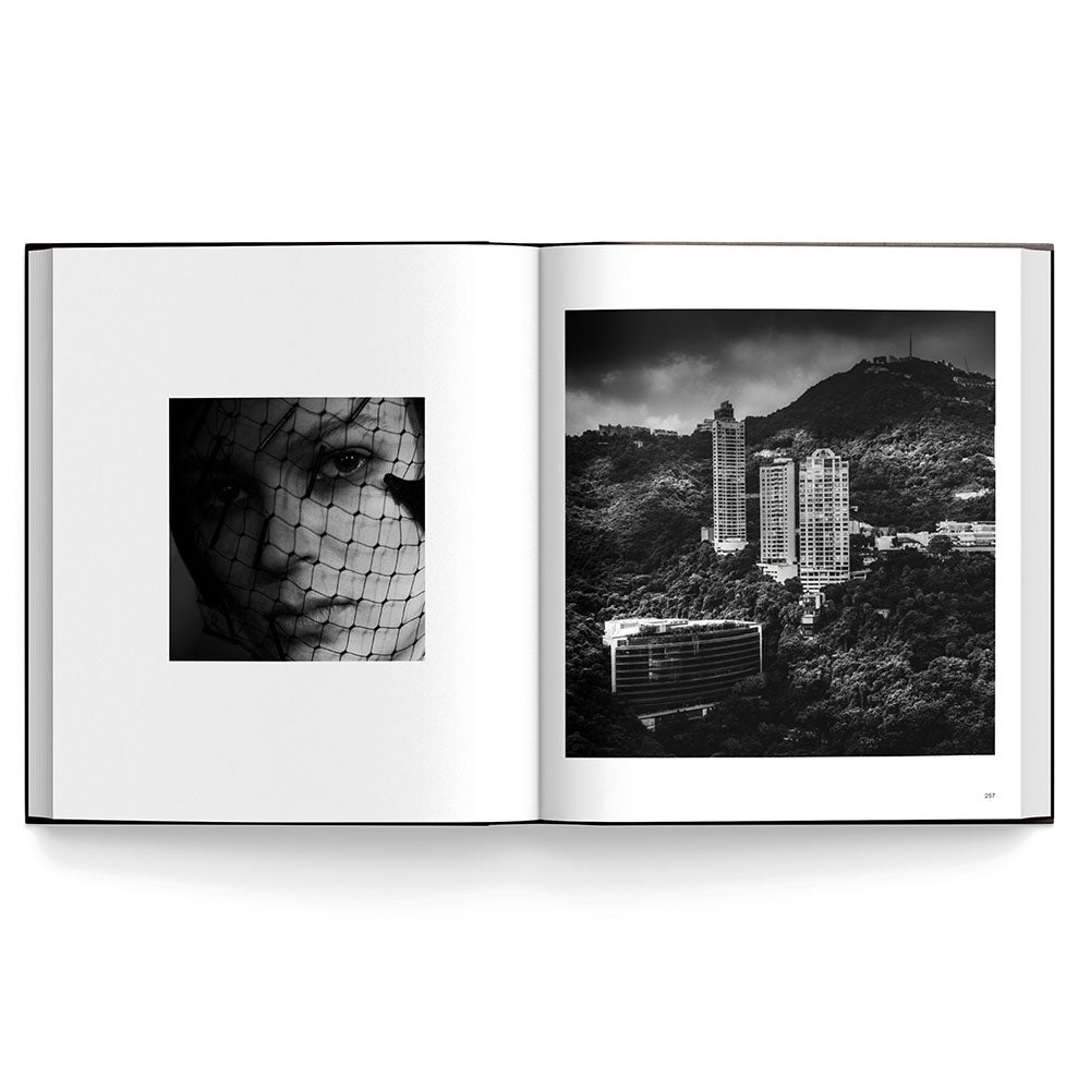 Daniel Arsham: Photographer, open-book image showing black & white shots.