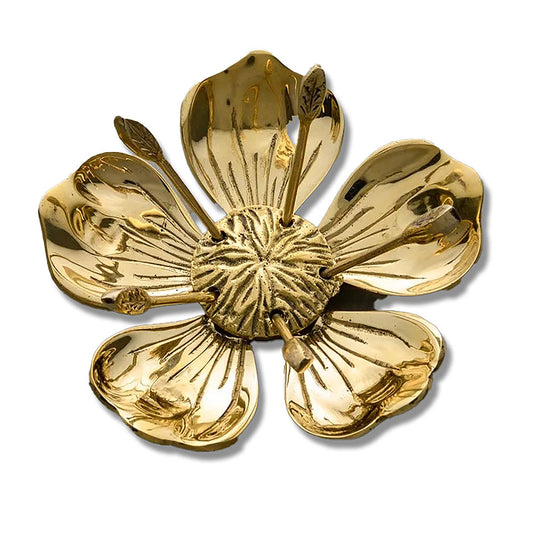 Flower Ash Tray, brass flower-shaped ash tray on white background