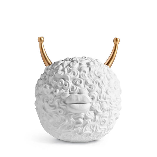 Haas Incense Burner Monster, a quirky and strange design well-crafted; a giant hairy ball with lips and golden horns.