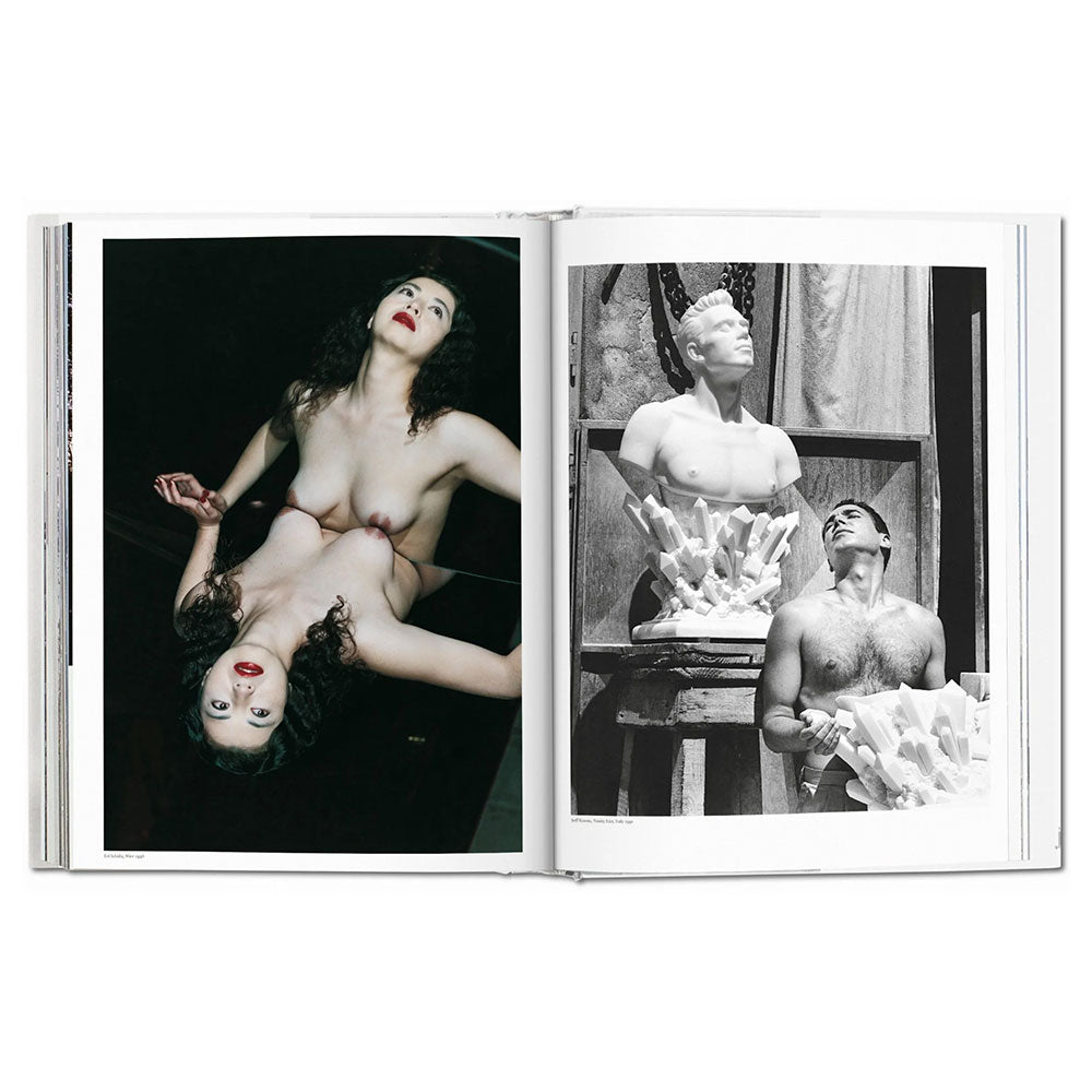 Spread of Helmut Newton SUMO Book, showing two black and white images of fashion models doing poses