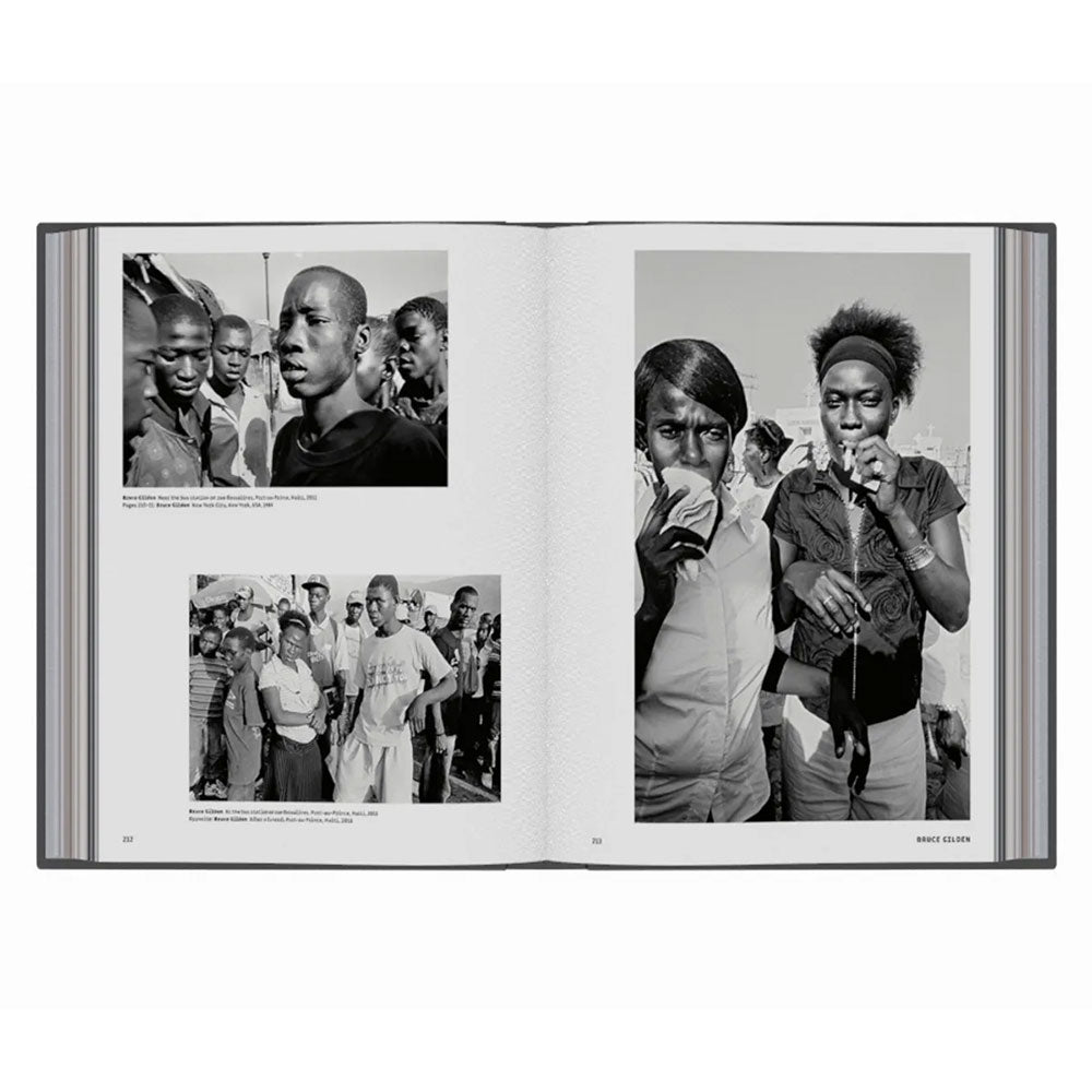 Spread shot of Magnum Streetwise, showing black and white photos of people on the left and right