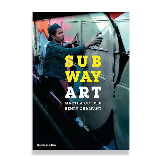 Book cover of Subway art, showing graffiti artist spraying a train.