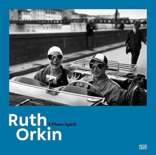Cover of Ruth Orkin: A Photo Spirit, showing a black and white photo of two people driving while wearing sunglasses.