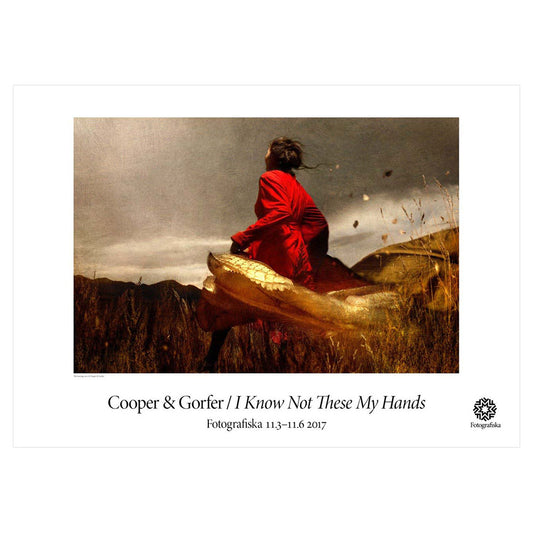 Color portrait of woman in red looking at the sky. Exhibition title below: Cooper & Gorfer | I Know Not These My Hands