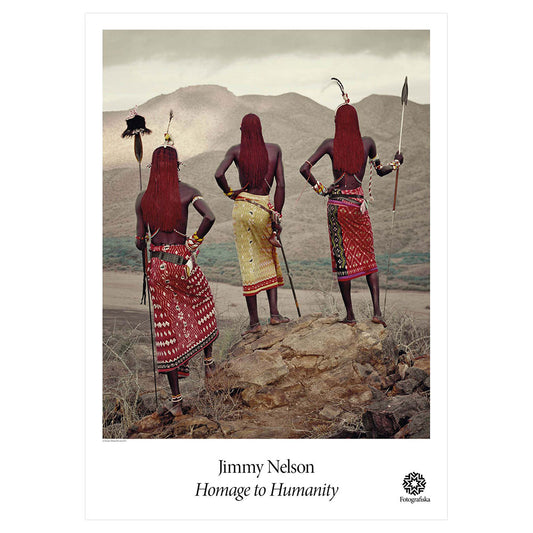 Group of three people in rocky area.  Exhibition title below: Jimmy Nelson | Homage to Humanity.