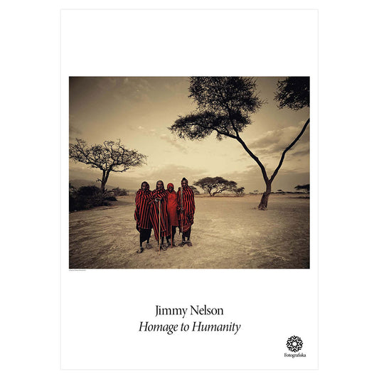 Group of natives in barren area with a few trees. Exhibition title below: Jimmy Nelson | Homage to Humanity