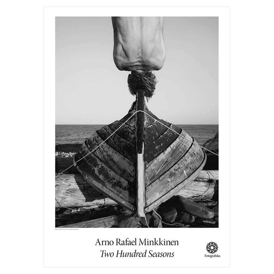Black and white image of person upside down on structure. Exhibition title below: Arno Rafael Minkkinen | Two Hundred Seasons