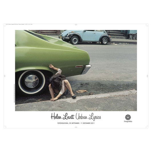 Colorful landscape of person crawling out from under a green car on the street. Exhibition title below: Helen Levitt | Urban Lyrics