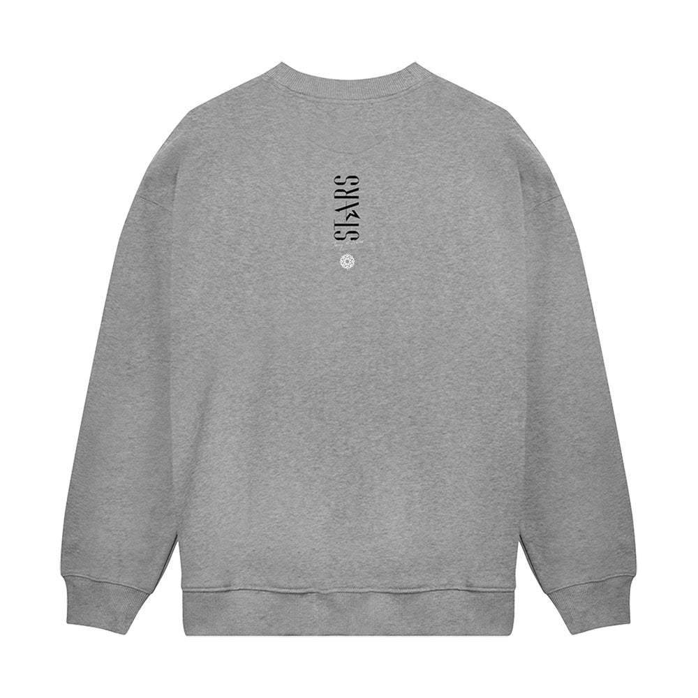 Grey sweatshirt showing exhibition title treatment of "Stars" on the back.