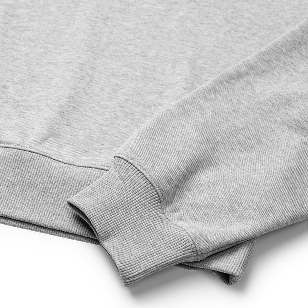 Closeup of the bottom of the sweatshirt, showing ribbed cuffs.