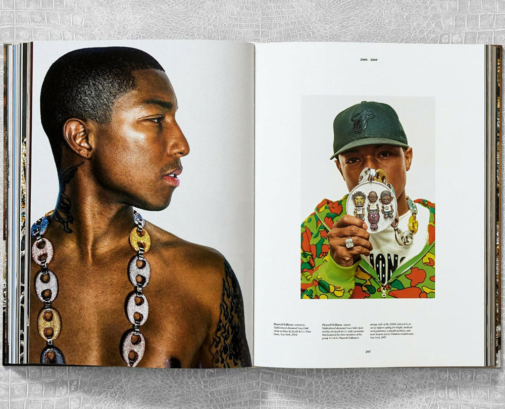 Ice Cold: Hip-Hop Jewelry History spread shot, showing Pharrell on the left and another artist on the right, both wearing jewelry