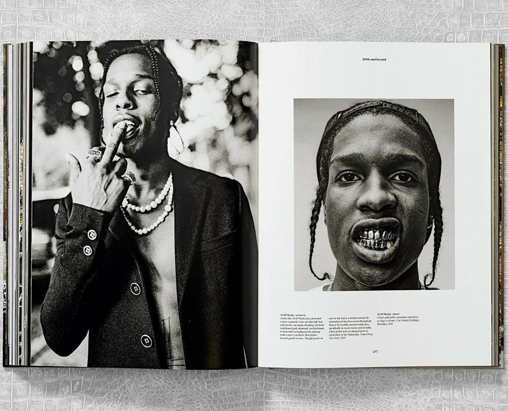 Ice Cold: Hip-Hop Jewelry History spread shot, showing black and white photos of hip hop artists revealing teeth on left and right
