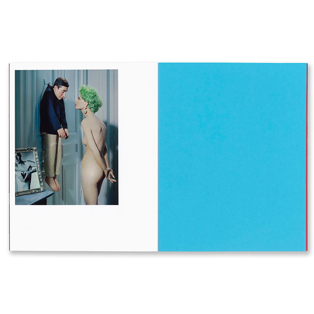 Miles Aldridge: after cattelan, opened and showing color image to the left and solid blue page on the right