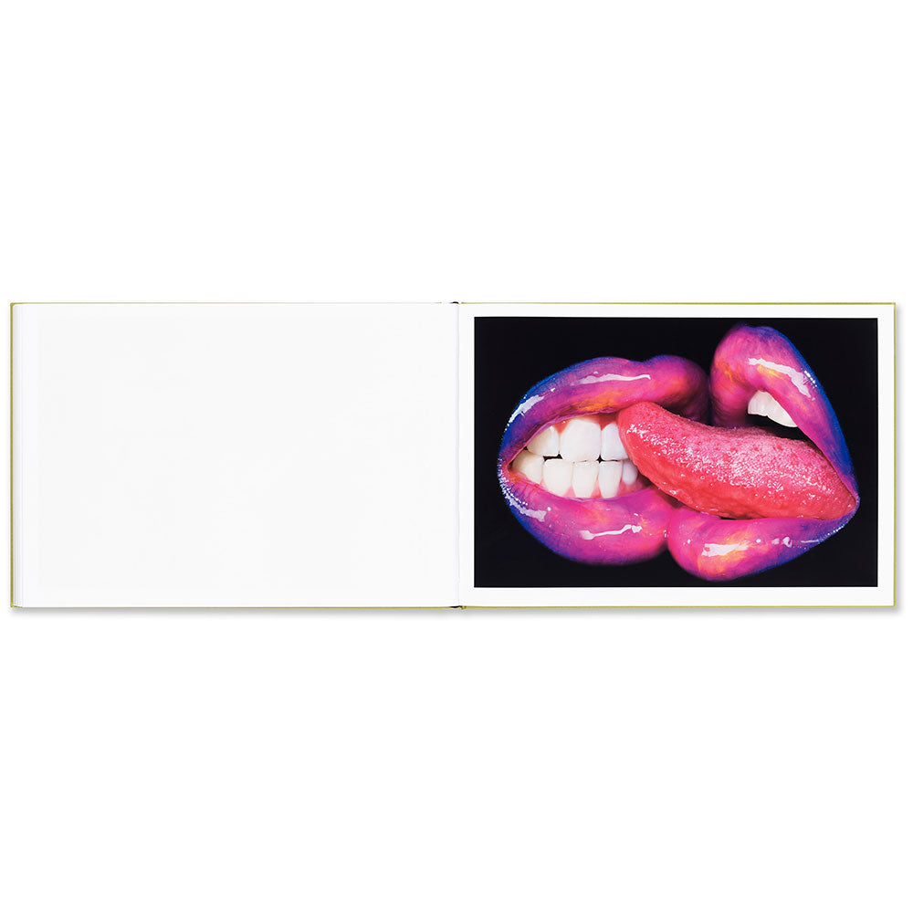 Miles Aldridge: Pictures for Photographs, open and showing colorful image on the right of two sets of lips close together