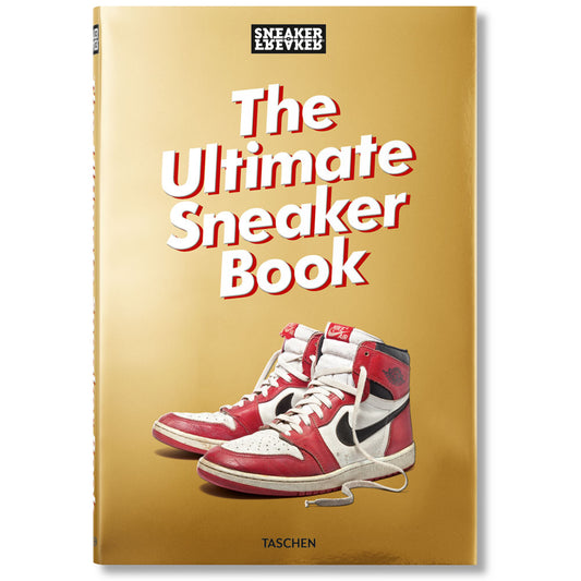 Golden book cover with red sneakers on the front and book title: "The Ultimate Sneaker Book"