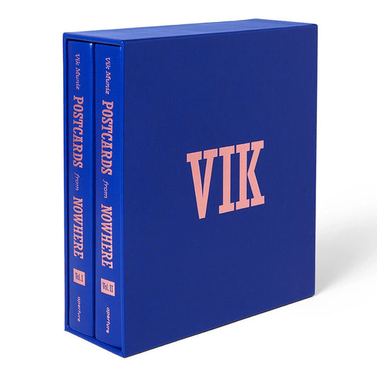 Blue books in jewel case with VIK written on the front