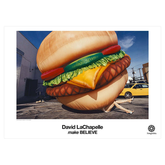 Women crushed by giant cheeseburger.  Exhibition title below: David LaChapelle | Make Believe