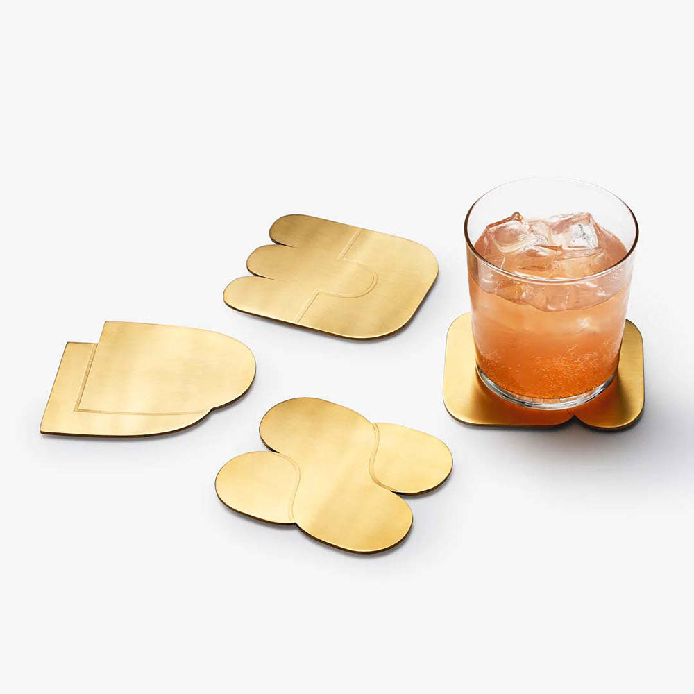 Brass "Together" coasters, dynamic shapes, with glass.