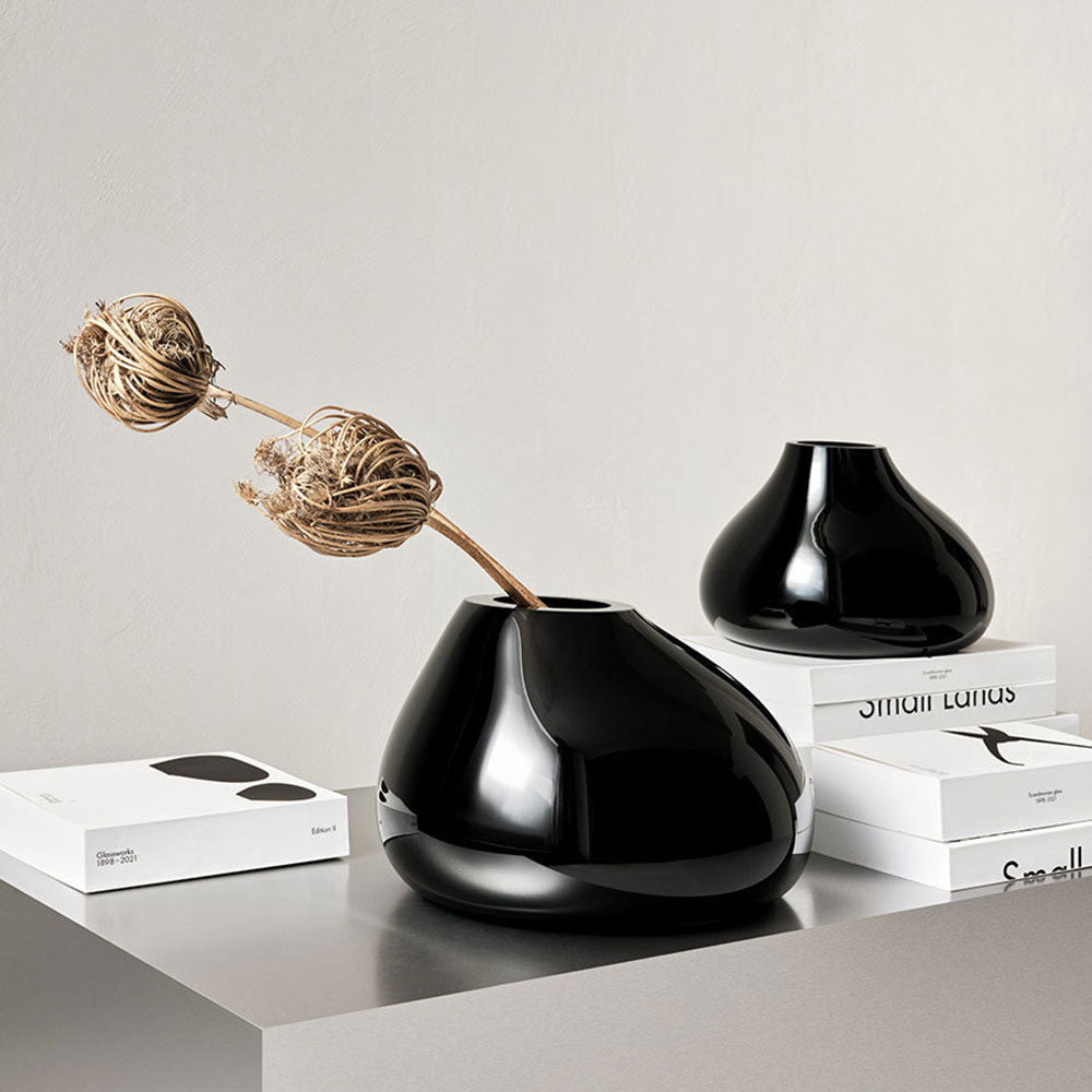 Ebon Vase Black, Medium, with flowers on a desk