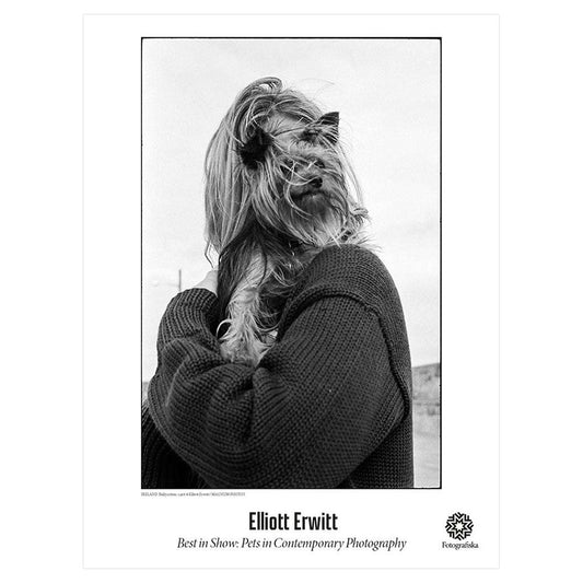 Elliot Erwitt - Ireland, Ballycotton, 1968 Poster.  Black & white photo of small dog being held