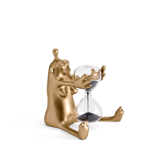 HAAS Just-a-Minute 1 Minute Timer.  A brass cute alien-like monster holding an hourglass.