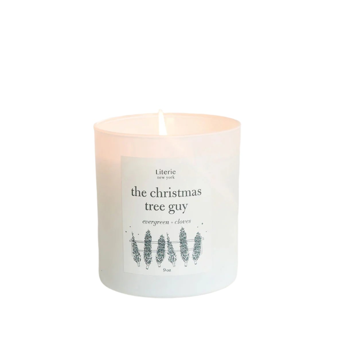 The Christmas Tree Guy Candle candle by Literie - notes of evergreen and cloves, shown lit.