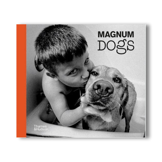 Magnum Dogs book cover, black and white photo of boy and dog
