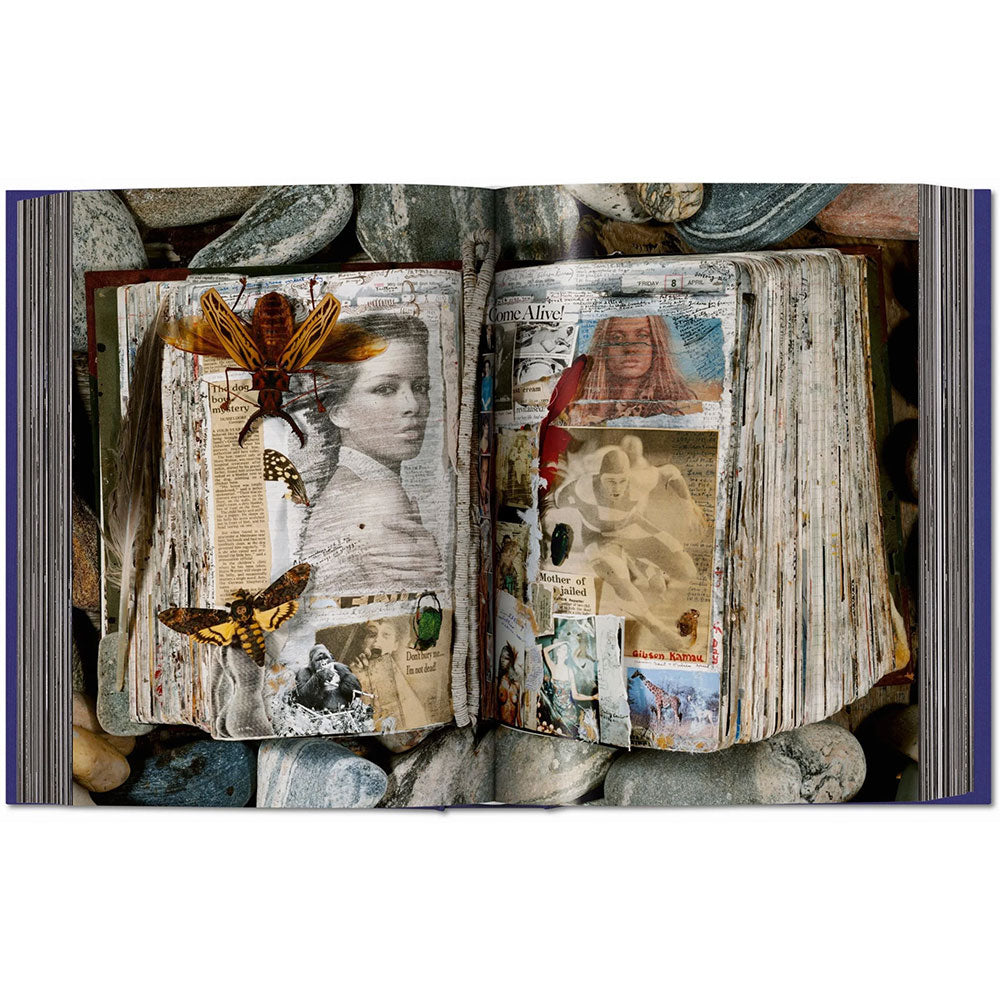Spread shot of Peter Beard, showing full-width color photo of torn book open to a page that has a picture of a woman