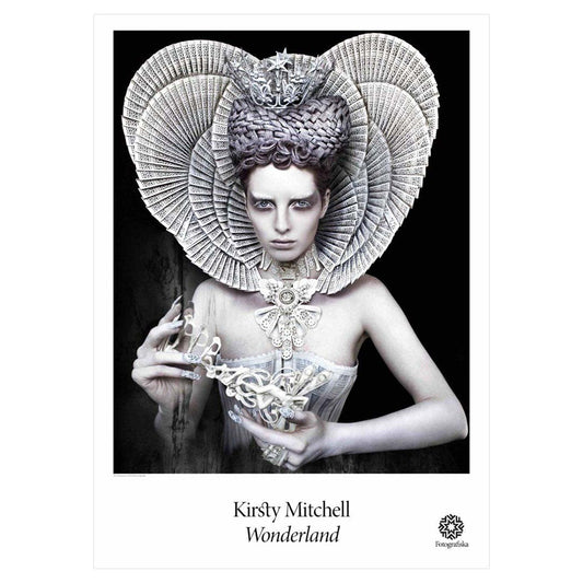 Image of pale person wearing decorative headwear. Exhibition title below: Kirsty Mitchell | Wonderland
