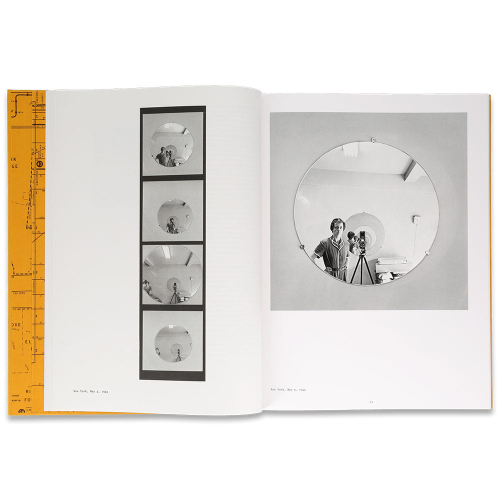 Vivian Maier book, open and showing black and white photos