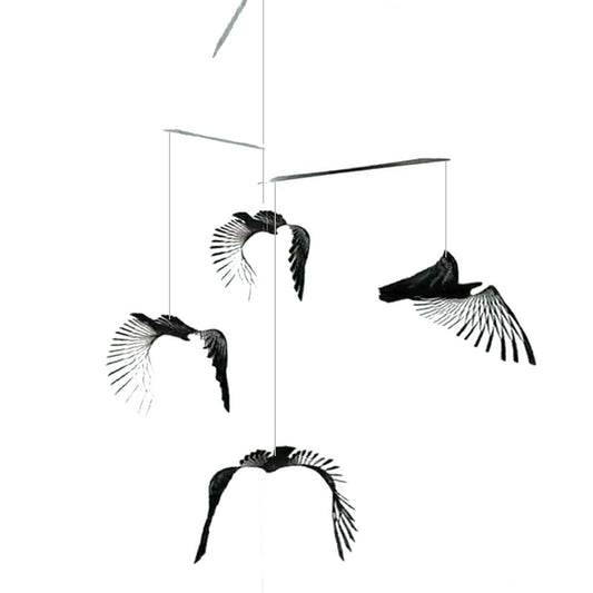 Black birds mobile on white background