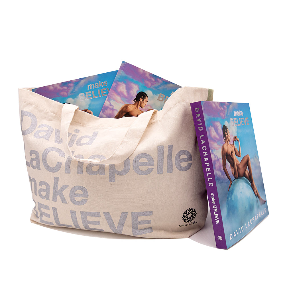 David LaChapelle canvas tote bag holding David Lahapelle exhibition catalogues.