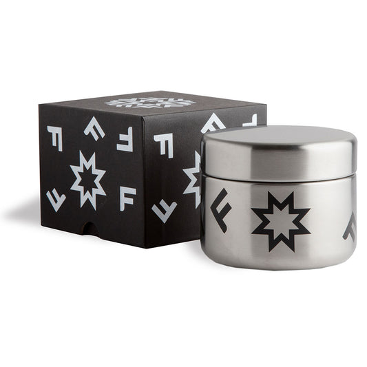 Durable and lightweight Fotografiska logo stainless steel snack box with black packaging.