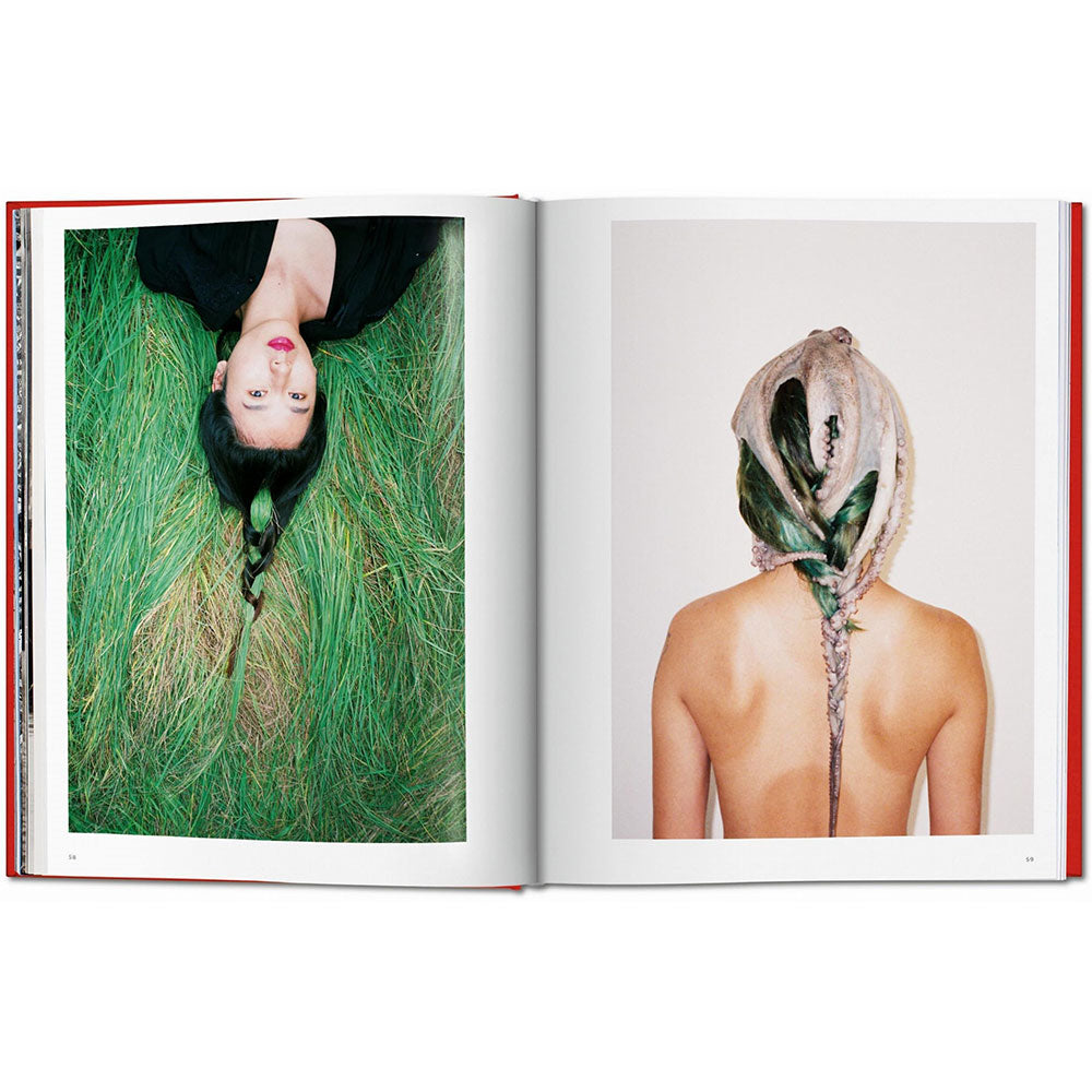 Spread shot of Ren Hang catalogue, featuring color photographs on both pages