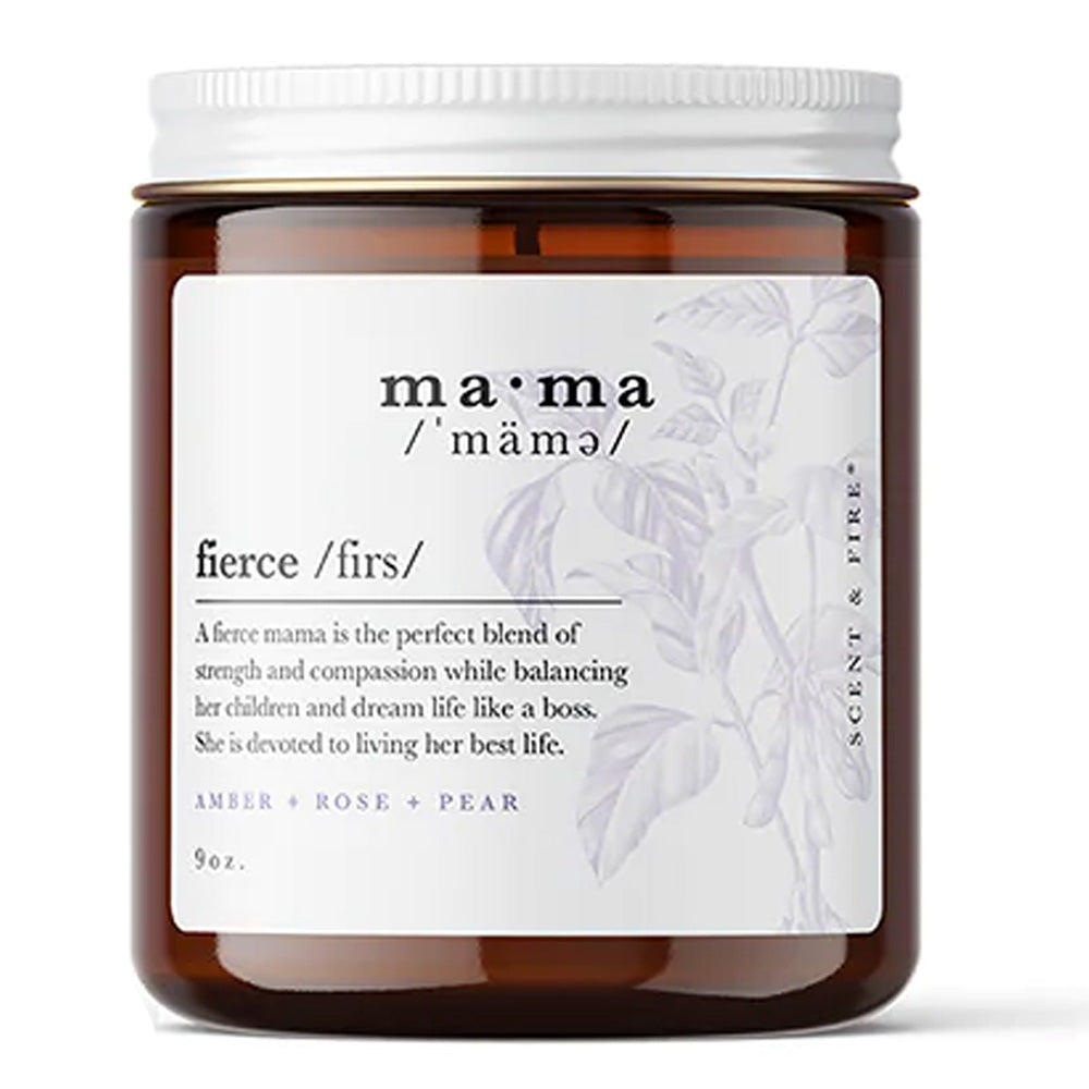 Candle jar with affectionate label that spells pronunciation of "ma-ma" and "fierce" along with a dictionary-style definition: A fierce mama is the perfect blend of strength and compassion while balancing her children and dream life like a boss. She is devoted to living her best life.  Ingredients below: Amber, Bone, Pear, 9 ounces