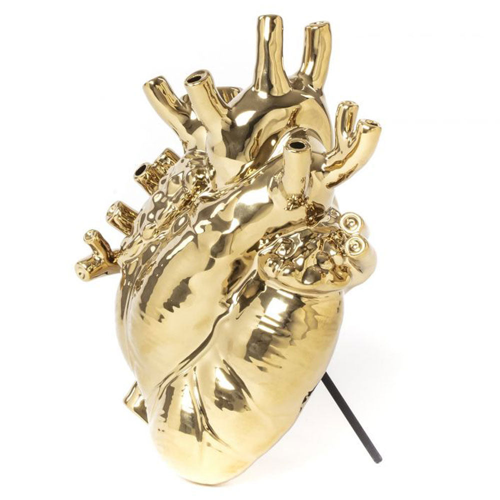 Seletti heart vase in gold, turned slightly